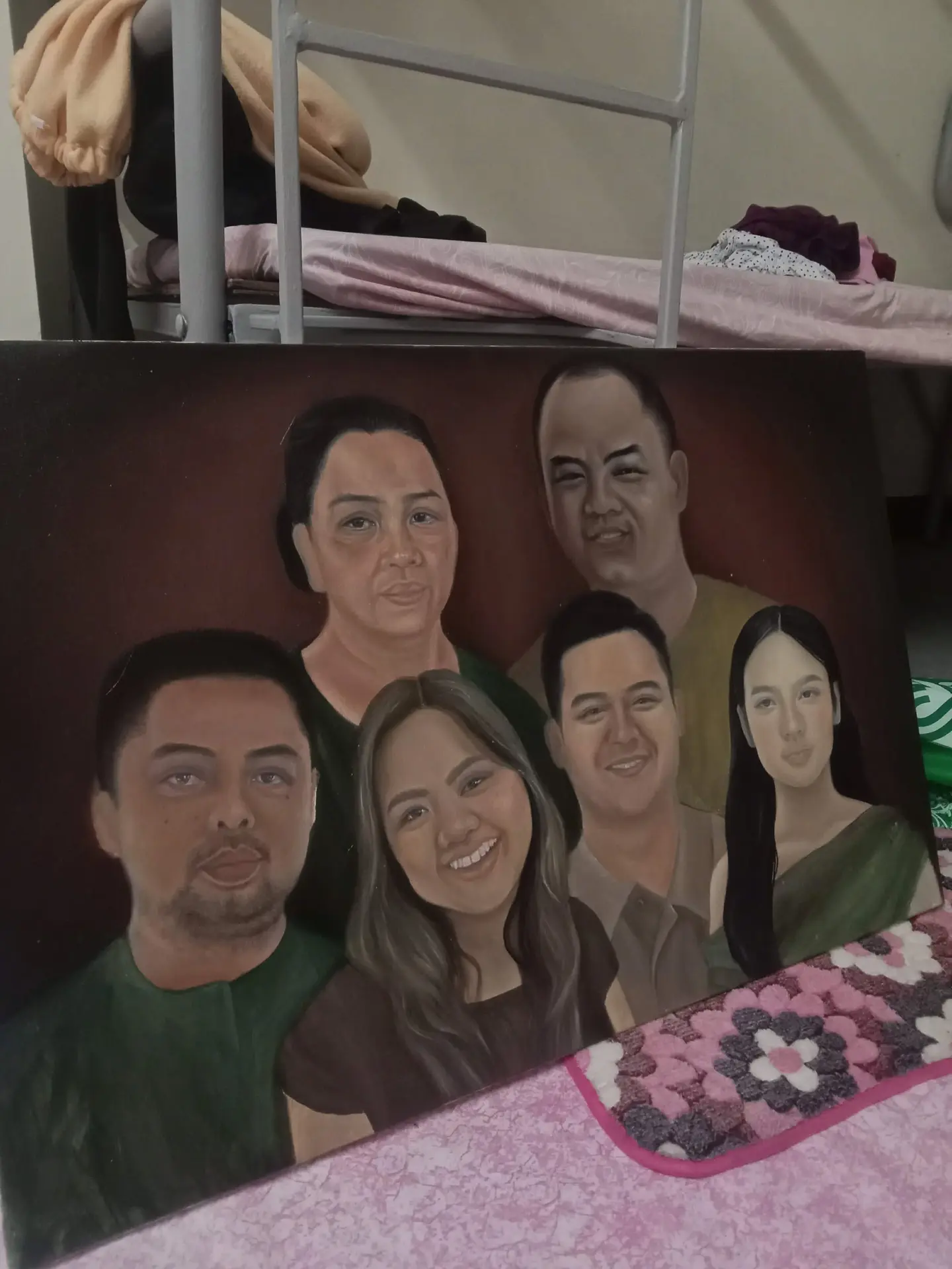 A hand-painted family portrait by Precious Angel Lopez